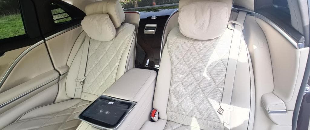 Mercedes-Maybach white quilted rear seats — The Noor Elite Maison Morocco